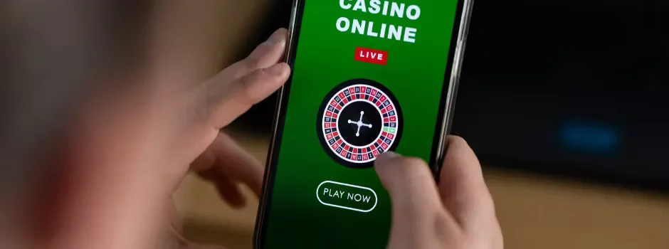 Brazilian woman using the 7TWIN app with a premium roulette visual behind her